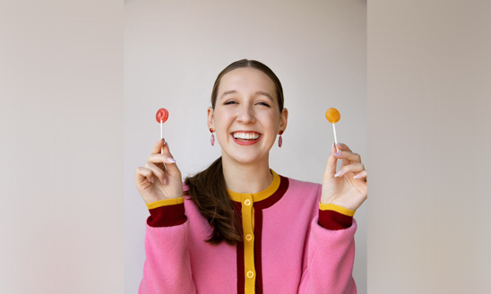 Alina Morse holding two ZolliCandy pops