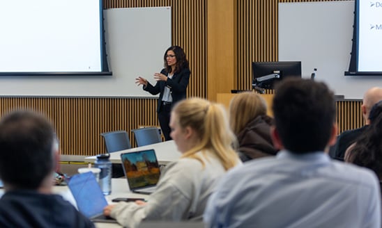 Irene Treter speaks to Full-Time MBA students in a classroom